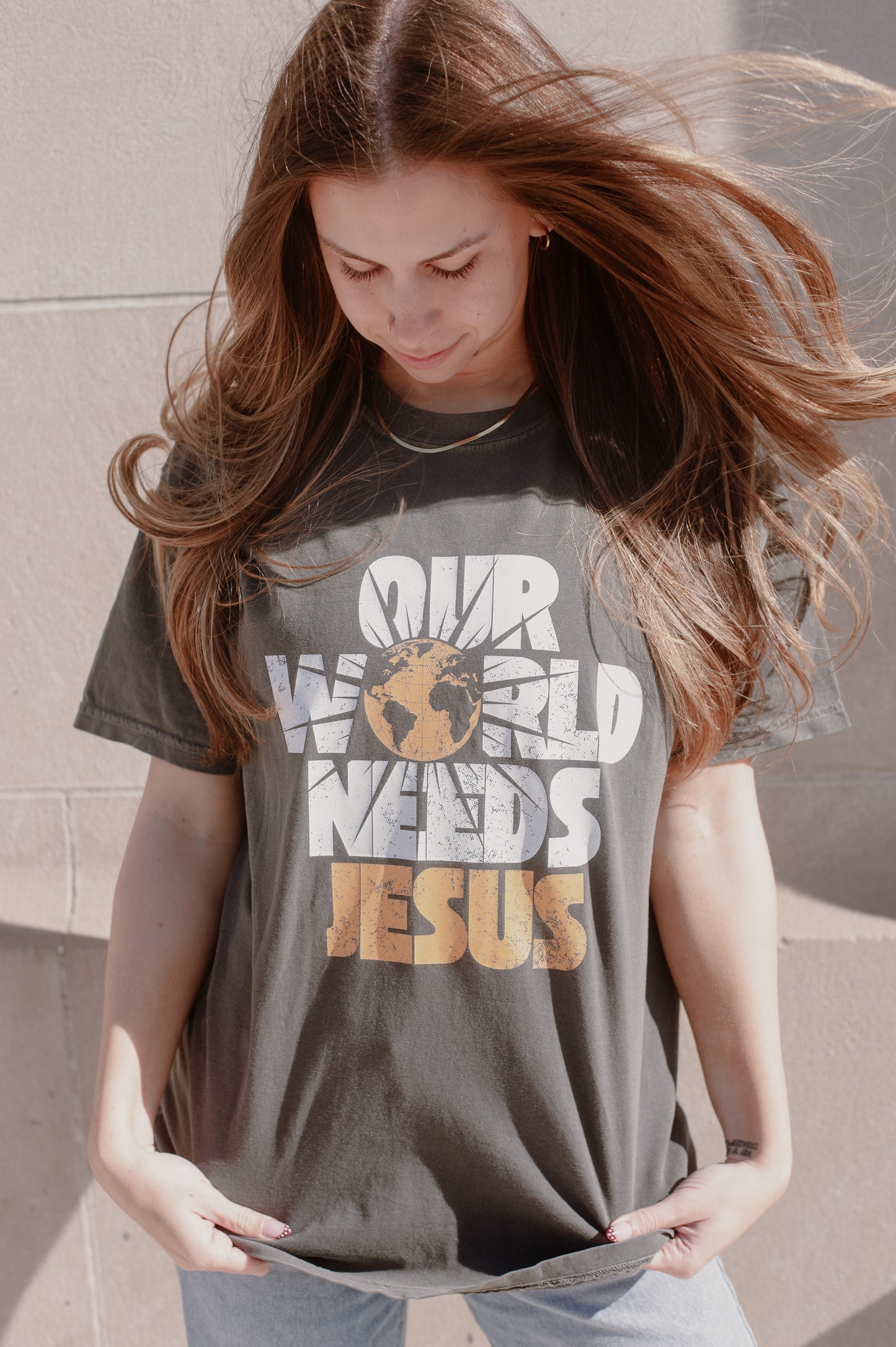 Our World Needs Jesus Tee – Christian Graphic Shirt